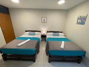 Voodi või voodid majutusasutuse Vianca Hotel toas