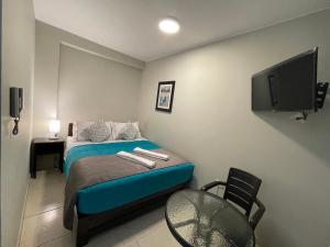 Voodi või voodid majutusasutuse Vianca Hotel toas