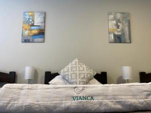 Voodi või voodid majutusasutuse Vianca Hotel toas
