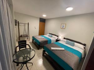 Voodi või voodid majutusasutuse Vianca Hotel toas