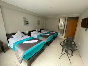 Voodi või voodid majutusasutuse Vianca Hotel toas