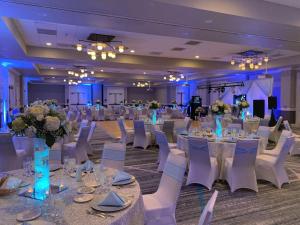 a banquet hall with white tables and white chairs at Embassy Suites by Hilton San Rafael Marin County in San Rafael +62 photos