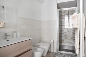 Koupelna v ubytování Casa Vacanze La Porta in Piazza + 12 fotografií