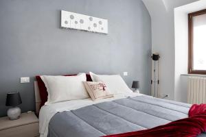 Postel nebo postele na pokoji v ubytování Casa Vacanze La Porta in Piazza