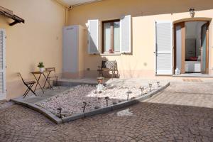 Patio nebo venkovní prostory v ubytování Casa Vacanze La Porta in Piazza