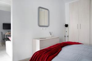 Postel nebo postele na pokoji v ubytování Casa Vacanze La Porta in Piazza