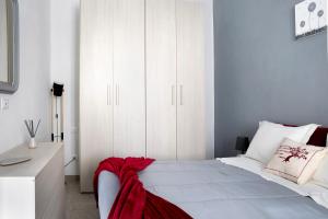 Postel nebo postele na pokoji v ubytování Casa Vacanze La Porta in Piazza