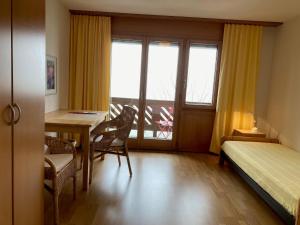 Postel nebo postele na pokoji v ubytování zentrumRANFT Seminarhaus - Haus der Stille