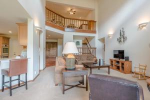 a living room with a couch and a table at Summit Condo 2815 in Elkhorn Village
