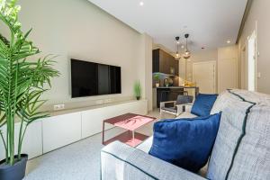 Televízia a/alebo spoločenská miestnosť v ubytovaní SUNSET MALAGA - PRIME & DESIGN
