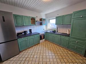 Kuchyň nebo kuchyňský kout v ubytování Gästehaus Weißes Lamm - MONTEURZIMMER
