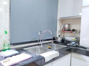 Kuchyň nebo kuchyňský kout v ubytování Permas Jaya 2 storey House + 29 fotografií