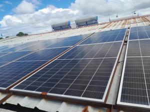 a group of solar panels on the roof of a building at Salama Hôtel Majunga in Mahajanga