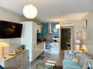 Kuchnia lub aneks kuchenny w obiekcie 21 - Très agréable rdc avec terrasse et parking