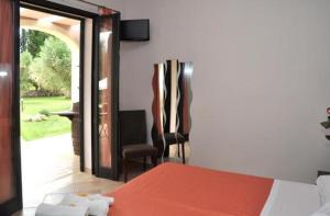 Postel nebo postele na pokoji v ubytování B&B La Zudrea