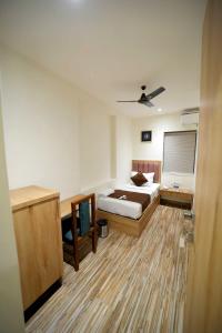 Ένα ή περισσότερα κρεβάτια σε δωμάτιο στο CABINSTAY-AIRPORT