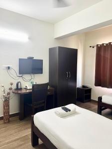 TV a/nebo společenská místnost v ubytování Hotel Coffee Bean