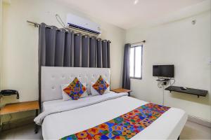 Ένα ή περισσότερα κρεβάτια σε δωμάτιο στο Via Osca Inn