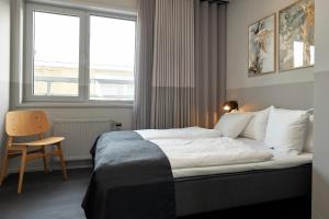 Letto o letti in una camera di CPH Hotel