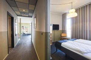 Letto o letti in una camera di CPH Hotel