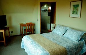 Postel nebo postele na pokoji v ubytování Hotel Seminario