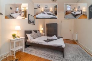 מיטה או מיטות בחדר ב-Large City Corner Apartment