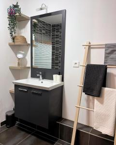 Een badkamer bij Le trendy - Strasbourg