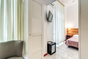 Letto o letti in una camera di Hotel Altavilla 9