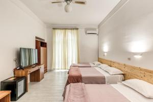 TV o dispositivi per l'intrattenimento presso Hotel Altavilla 9