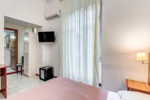 TV o dispositivi per l'intrattenimento presso Hotel Altavilla 9