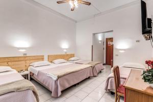 Letto o letti in una camera di Hotel Altavilla 9