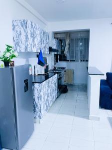 Kuchyň nebo kuchyňský kout v ubytování Classy two bedroom Airbnb with swimming pool