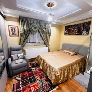 Ένα ή περισσότερα κρεβάτια σε δωμάτιο στο Elegancia del JJM