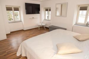 A bed or beds in a room at Apartment Altstadt Passau