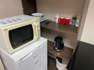 Kuchyň nebo kuchyňský kout v ubytování Coral guest house Netanya