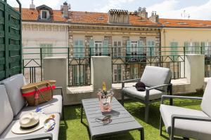 Posezení v ubytování Hôtel Byakko Nice