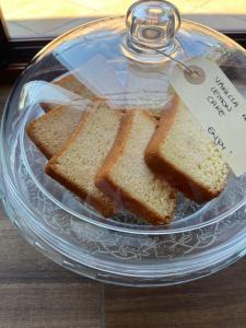 a glass plate with slices of bread on a table at Bellavista Mansion in Agerola