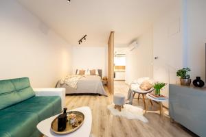 A bed or beds in a room at ERKEL 18 APARTMAN