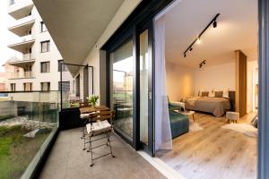 A bed or beds in a room at ERKEL 18 APARTMAN