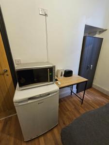 Kuchyň nebo kuchyňský kout v ubytování Double en suit room in Levenshulme (2)