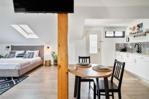 Voodi või voodid majutusasutuse Valley Suites toas