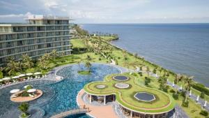 an aerial view of the resort and the ocean at Biệt Thự Villa - Sao Biển - Ngọc Trai FLC Sầm Sơn in Sầm Sơn