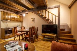 Kuchyň nebo kuchyňský kout v ubytování Guest House Vila Bajka