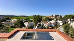 a house with a swimming pool on top of a roof at M324 - Marcelli, delizioso trilocale con terrazzo panoramico in Marcelli