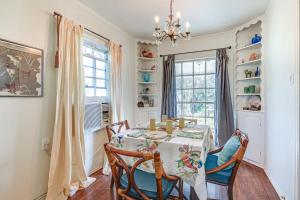 a dining room with a table and chairs at Quiet Fort Worth Home Less Than 1 Mi to TCU Campus! in Fort Worth