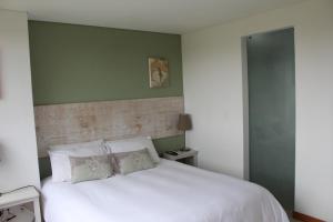 Postel nebo postele na pokoji v ubytování LLanogrande Apartamento Estudio Puerto Bulevar