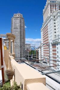 a view of a city skyline with tall buildings at Gran Vía-Plaza España 2 habitaciones in Madrid