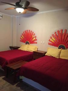Postel nebo postele na pokoji v ubytování Tai Condo 3