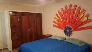 Postel nebo postele na pokoji v ubytování Tai Condo 3