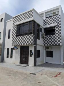 Το κτήριο όπου στεγάζεται  το δωμάτιο σε οικογενειακή κατοικία